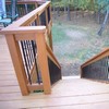 Stairs with black picket in railing